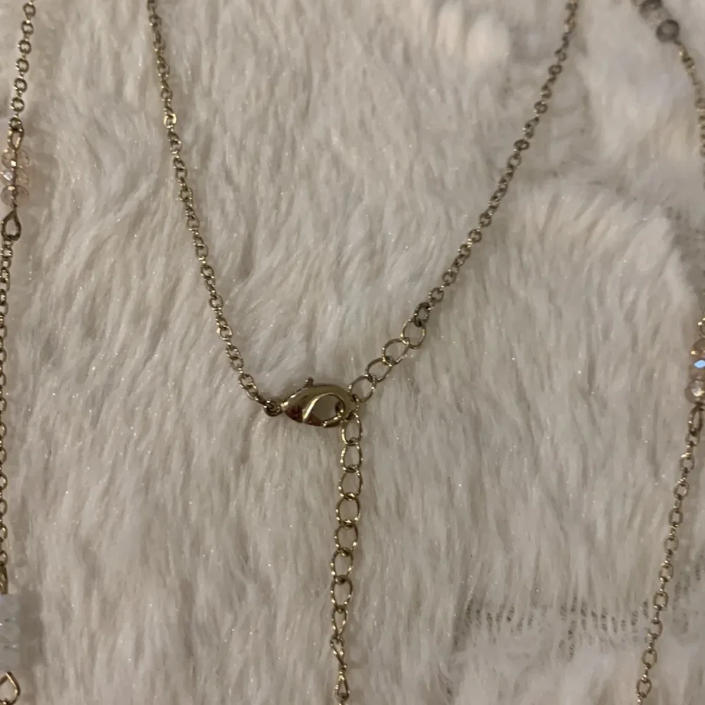 Disc‎ pendant necklace with some little beads on chain.Beautiful and sparkly.